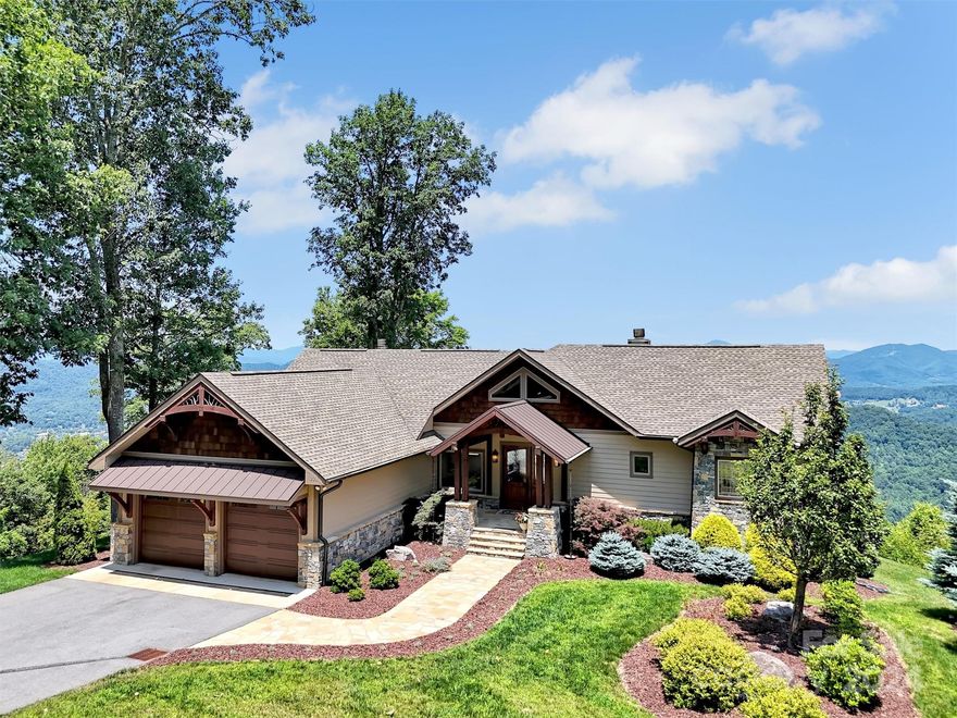 Stunning Post & Beam Masterpiece, with breathtaking views, in the gated community of Smoky Mountain Sanctuary. Meticulous craftsmanship is evident throughout, w/soaring ceilings, exposed beams & expansive windows that invite natural light & stunning mountain vistas, which add a picturesque backdrop to your daily life. This exquisite residence showcases remarkable architecture & offers unparalleled VIEWS. A magnificent property that boasts FOUR spacious ensuite bedrooms, featuring luxurious baths, granite, custom vanities & tile showers. Designer lighting throughout. Kitchen has custom cabinetry, granite, copper sink & 6 burner gas range. Cozy up to the warmth of 3 beautiful stone fireplaces, incl. 1 outdoors, perfect for relaxing under the stars! Situated in a cul-de-sac which offers privacy & located in a community with a tennis court & large pavilion for gatherings. Property is just minutes to downtown Waynesville & just above Waynesville Inn & Golf Club. Being sold mostly FURNISHED!