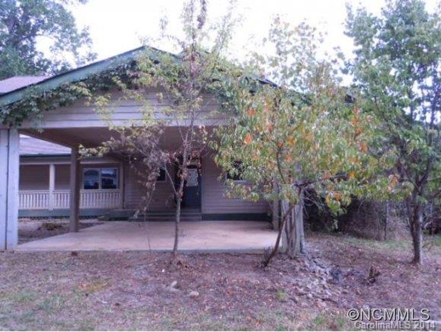 Property is Sold As Is. Buyer to confirm all info. Unique opportunity to own home in beautiful Reems Creek area! Level 4+ acres. Extremely private yet only 10 mins to downtown Weaverville. Tons of potential! Septic is for 3 bedroom. Several bonus rooms. Pre-approval letter or POF must be w/offers