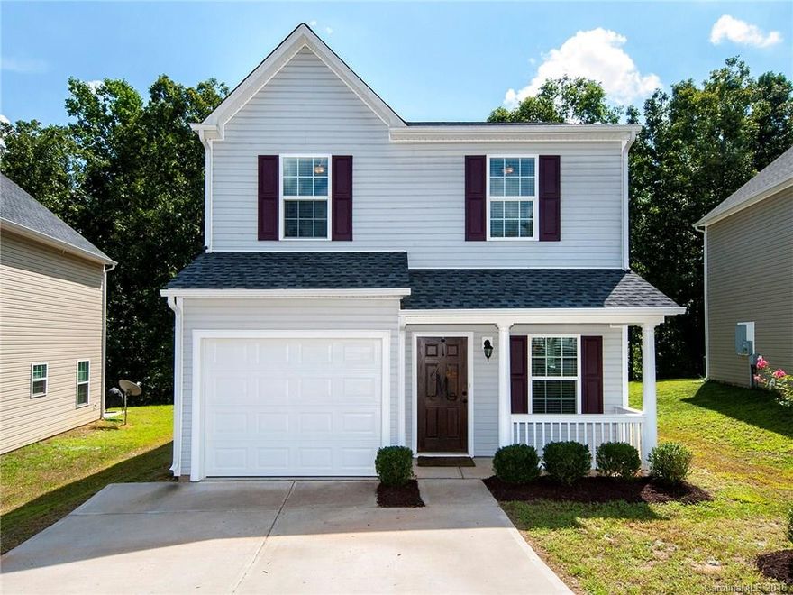 A rare find in Fort Mill, 2 years old, award winning schools, granite counter tops with stainless steel appliances, 2 inch blinds. Backs up to woods, close to downtown Fort Mill and a short drive to Ballantyne. Move in ready...this one won't last! Neutral colors, no HOA, USDA eligible, private back yard!