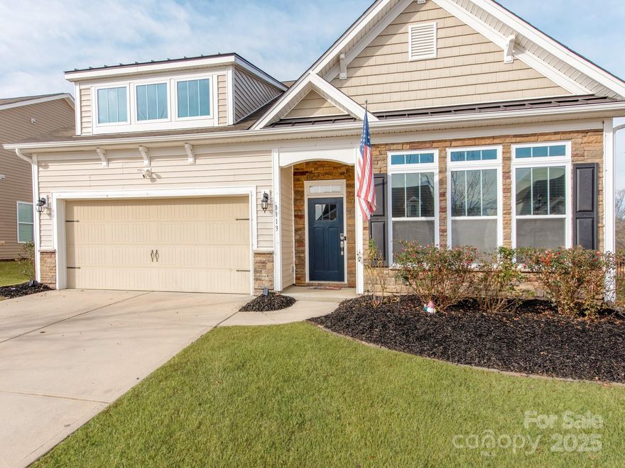 This beautiful 1.5 story home has 4bds 3 bths and is located in one of the most sought-after neighborhoods of Lake Wylie/ Clover and is also in the Newest state-of-the-art Clover School Districts! This home blends luxury and convenience with thoughtful design throughout including tall 10ft+ Ceilings, fenced in backyard with covered back porch and extended concrete patio overlooking private wooded setting, and too many upgrades throughout to count.  Inside, the show-stopping 14-foot kitchen island anchors a true Chef’s Kitchen overlooking the large living room with many details including custom built-ins! The open-concept main level features soaring 10+ foot ceilings and generously sized rooms that create an airy, inviting atmosphere. The primary suite and 2 other bedrooms are  conveniently located on the main floor for ease and comfort. The upstairs includes a spacious bedroom suite that can function as a second living quarters, guest suite, bonus room, or officet. Residents enjoy excellent accessibility to Charlotte, offering an easy commute and close proximity to top restaurants and everyday conveniences. Nearby Marinas and Lake amenities make weekend adventures effortless. The neighborhood offers an active, involved social community where you can be as connected—or as private—as you choose!