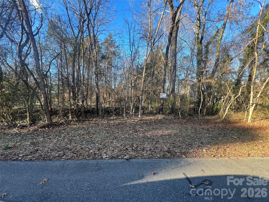 Two side-by-side buildable lots at 2579 & 2583 Saddlewood Cir SW offer a rare opportunity in Concord with RM-1 zoning and city water and sewer already available. Each lot is approximately .6 acres. Together you get a combined 1.2 acres. These lots are ideal for spec homes, townhomes, or a small multi-family project, with strong new construction upside supported by nearby comps. The lots are buildable with a culvert needed for driveway access.