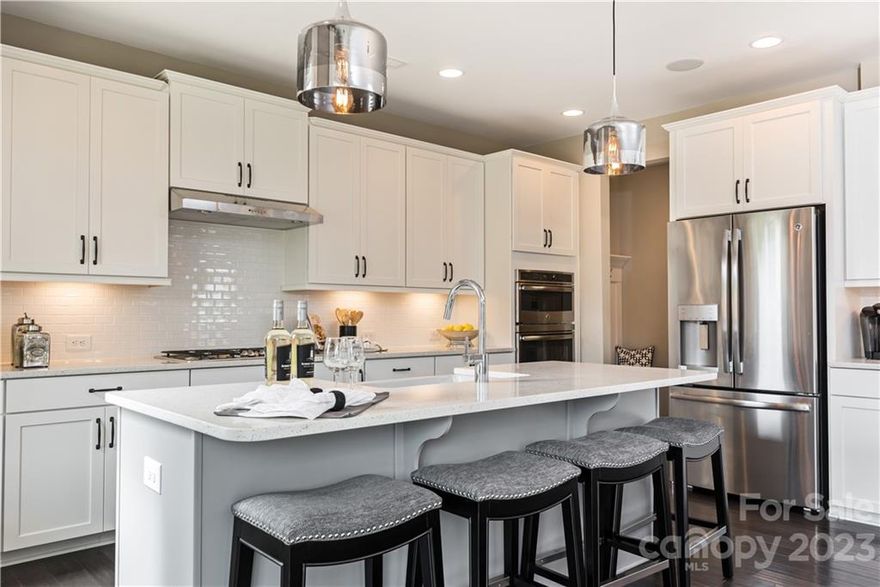 MLS # 3936073  REPRESENTATIVE PHOTOS ADDED. Summer Completion! This Somerset floorplan comes complete with 5 bedrooms, 4 baths, a beautiful 2 story open foyer with a guest suite on the main floor. 2nd floor offers 4 bedrooms and 3 baths in which 2 of the bedrooms share a Jack and Jill bathroom. The gorgeous gourmet kitchen features a large island, walk-in pantry as well as a 36" gas cooktop and beautiful upgraded finishes. Design options include: owner's suite bath with tile surround, full oak treads with craftsman's railing, 36" gas cooktop, quartz countertop in kitchen and in owners suite bath. Structural options added to 2805 Suffolk Place include: tray ceilings, additional bedroom and bathroom with shower, covered outdoor living, additional windows, fireplace, laundry sink, butler's pantry, and gourmet kitchen.