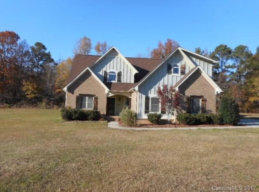 Rustic 1.5 Story home situated on 2.28 Acres in the desirable Buford School District.  Vaulted Ceiling in Great Room, Formal Dining Room, Country Kitchen with Work Island, Farm Sink, and Wooden Cabinets. Breakfast area and Walk in Pantry.  Laundry Room. ALL APPLIANCES REMAIN, Including  Refrigerator, and  Washer and Dryer.  Office/Study. Master on Main. 2 Walk-in Closets, Whirlpool Tub and Seperate Shower. Up Stairs 2 Bedrooms, and Bonus Room. Open landing. Patio