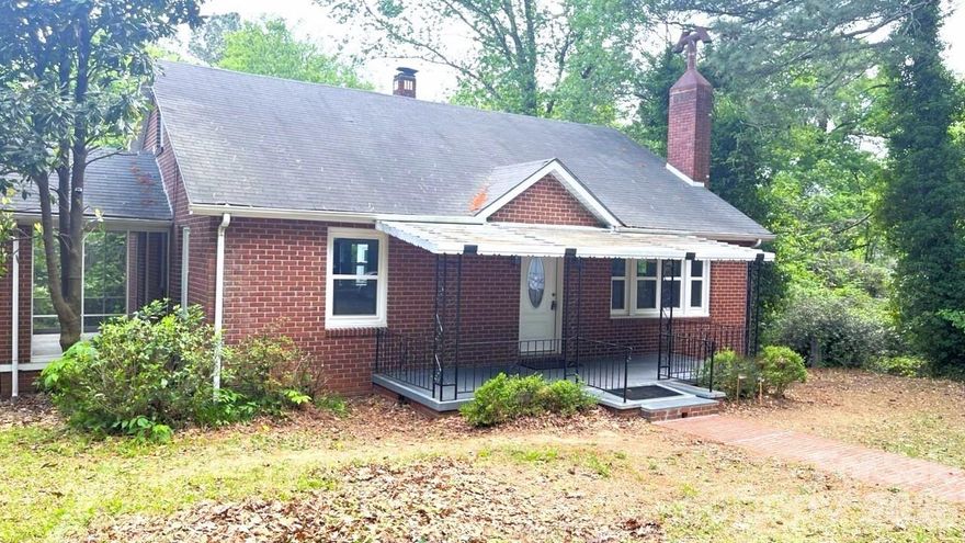 Welcome to a move-in ready brick home in Mount Gilead with classic character, beautiful hardwood floors, and new windows throughout. From the bright sunroom to the screened porch, finished basement, and private backyard, this home offers inviting spaces inside and out. The large living room features a built-in fireplace area with flexibility for a gas, wood, or electric fireplace setup. The kitchen includes new soft-close cabinets, new appliances, including refrigerator, dishwasher, range hood, gas cooktop, and oven, plus a high-quality quartz countertop. A spacious dining area provides comfortable room for meals and gatherings, while the sunroom is a beautiful place to enjoy breakfast, morning coffee, or natural light throughout the day. The primary bedroom offers a comfortable retreat with an updated bathroom featuring an Onyx shower panel. The second bedroom provides direct access to the screened porch, creating a relaxing additional space with a separate entrance. The home also includes a front porch with a small brick path leading to the house. On the second floor, there is a third comfortable bedroom or office area, offering flexibility for work, guests, or additional living space. The heated finished basement provides additional usable space and includes installed hookups, allowing a laundry area to be created in the basement. Outside, the home offers its own backyard with space to relax, garden, play, or enjoy outdoor time, plus a backyard storage shed for added convenience. Come experience the charm, updates, and comfortable spaces this Mount Gilead home has to offer.