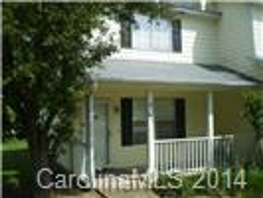 Move in ready end unit condo close to I-77.