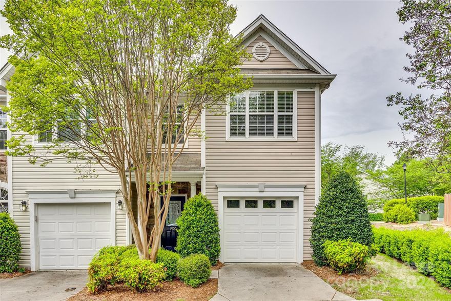 What a find! Beautiful END UNIT townhome. Gorgeous HW flooring throughout the main level. Great Room features a corner fireplace with a built-in TV niche. An Arched doorway leads to the Kitchen which features granite counters, tile floor, SS appliances, and a convenient pass-thru window to the dining area. Vaulted Primary has a WIC & en-suite bath. The primary bath has a separate shower/garden tub and a double sink vanity. Two nice-sized secondary bedrooms. Private enclosed patio. 1 car garage and limited driveway for one car.  Washer/Dryer included. Limited parking. Community pool. Pets conditional. **No Cats**