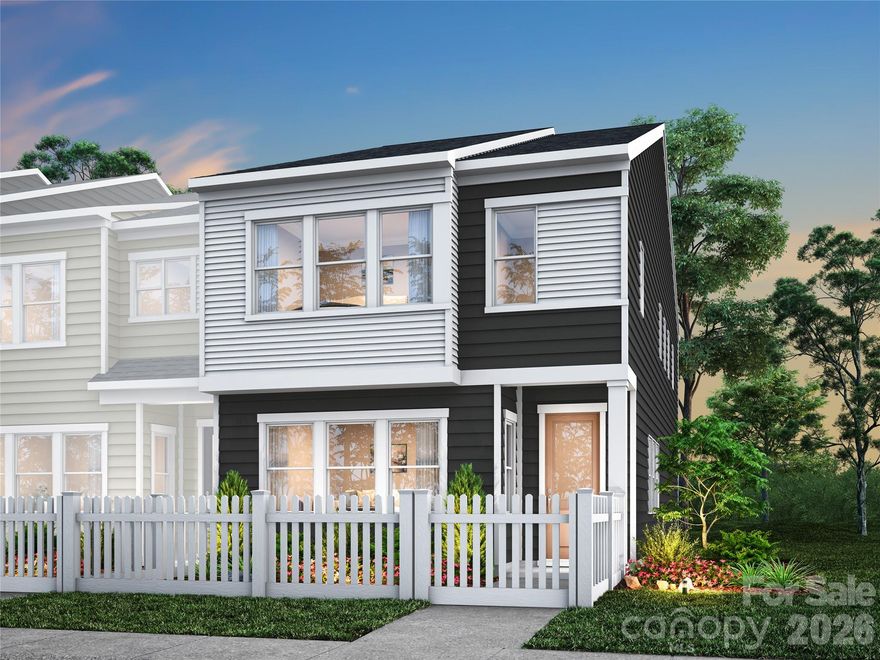 Light-filled living and thoughtful design define this end-unit home at Ellis Townes. Located at 8402 Discovery Lane with an anticipated move-in of September 2026, this residence pairs everyday comfort with elevated style. A fenced front yard creates a welcoming first impression and offers an outdoor retreat, while the 2 car rear load garage keeps the streetscape charming and uncluttered. Inside, planned selections add warmth and function, including oak box stairs and additional kitchen cabinetry for enhanced storage and style. The primary suite is designed as a true retreat, and will feature a shower with a built-in seat, tiled walls, and a tiled floor pan for a refined finish. Designability is where the experience becomes uniquely yours, with an expert design team guiding you through every detail at the award-winning design studio. From personalized selections to tracking progress through a one-of-a-kind app, this home is crafted to reflect your vision from start to finish.