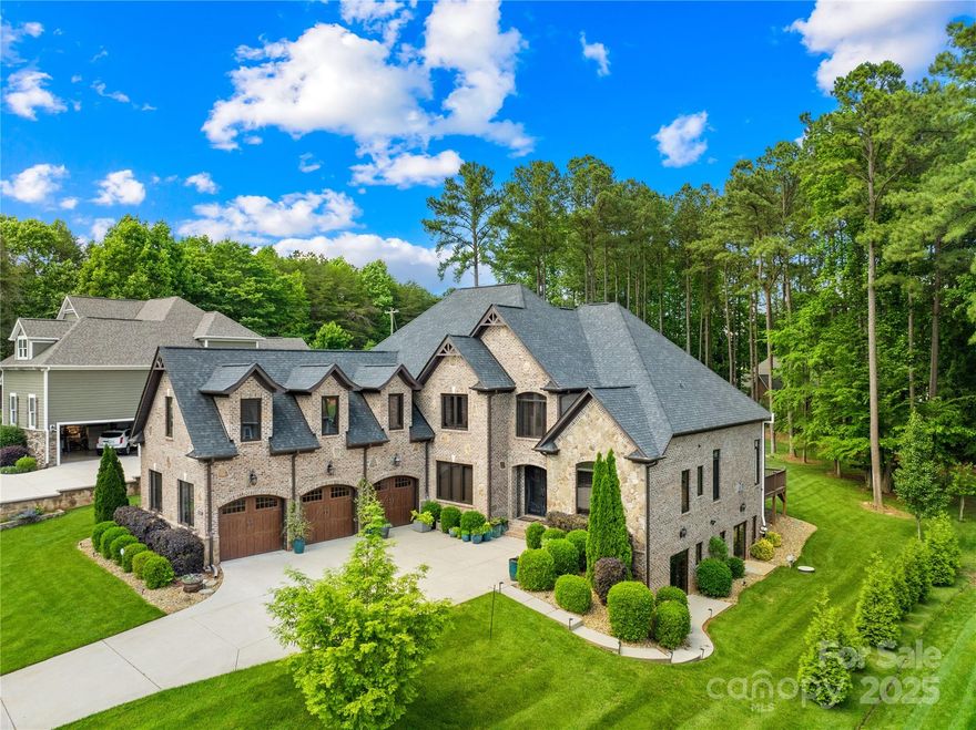 Love where you live! Custom executive home now available, located in the coveted Woodleaf subdivision, Mooresville, NC. This home provides the perfect combination of sophisticated elegance and a comfortable lifestyle, from entertaining to convenience. From the moment you step through the wrought iron double doors, into the 2-story foyer and beyond, the architectural details are sure to impress! Complete floor plan in attachments. Expansive kitchen in this luxury home is a chef's delight, with an island that seats 8, double convection ovens, gas range with warming drawer, copper sink, beautiful ceiling, and much more. Other features: Hardwood floors throughout (other than wet areas), multi-level tray ceilings, coffered ceiling, custom closets and pantry, whole-house generator, basement framed and plumbed for 2 baths, and plantation shutters. Don't miss a tour of this gorgeous property. Close to shopping and dining, plus all the Lake Norman area has to offer! Make an appointment today!