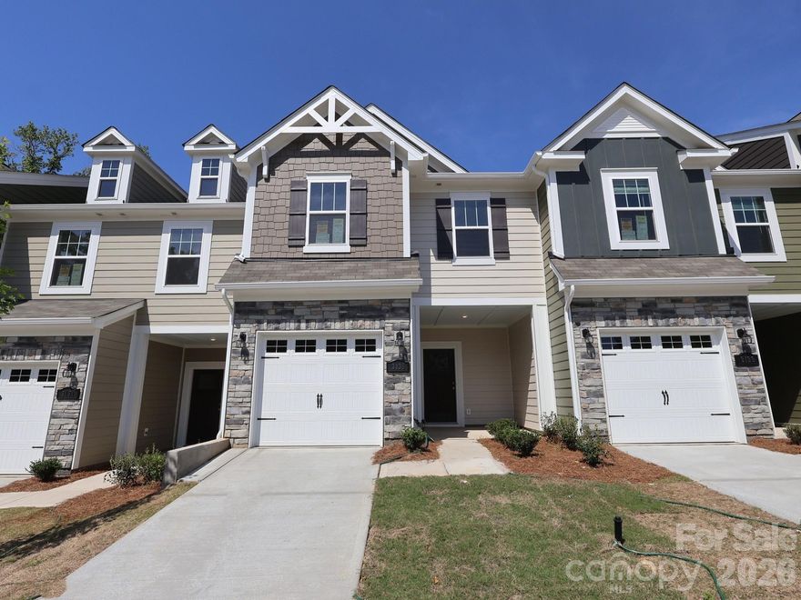 Welcome to the Manchester! Walk in straight from your front covered porch and embrace the homey feel of your foyer. Through the foyer you'll be greeted with a spacious kitchen, with an island for more space to cook and entertain. With our open floorplan, you have easy access to the family room to enjoy conversation and quality time. With enough space to easily fit a sectional, coffee table and other furniture, the family room is the perfect spot to unwind. Through the sliding doors is a private patio, perfect for entertaining or enjoying a morning coffee. You'll notice the main level has been finished with easily maintainable EVP flooring to make cleaning quick. Take the staircase to the upper level, where you'll find two additional bedrooms and the secondary bath that is easily accessible to the additional bedrooms to ensure everyone is satisfied. The same-level laundry room will make laundry days a breeze. Finally, the spacious owners bedroom with ensuite will allow for maximum privacy and comfort, with enough space to fit a king size bed as well as other furniture. The en-suite features a tiled shower, dual vanity & private toilet area. The walk-in closet is spacious enough to accomodate any size wardrobe.