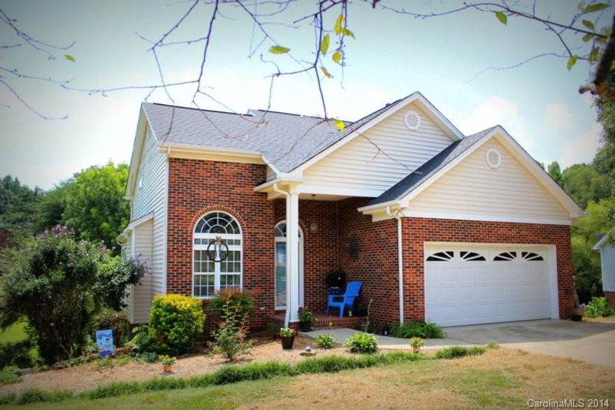 REDUCED- Gastonia- Basement home- Camden located off of Hoffman/ backs to Su-san Farms.  Lovely 4 bed/ 2.5 bath home, master on main, granite countertops, freshly painted, large rooms, walk-in closets, vaulted LR w/ gas FP, huge deck overlooking half acre+ yard, finished basement with half bath and walk out patio, large basement workshop, tons of storage.  Home is in excellent condition, brand new AC.  Great price at only $193,000.  Robinson, Cramerton Middle, Forestview schools. Call Kelly