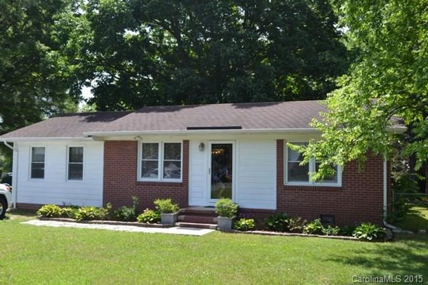 What a dollhouse!  Well maintained home sits on half an acre lot.  This home is not a part of a subdivision and is in the county.  Split bedroom plan with three bedrooms, spacious living area.  Great kitchen with a work island/sandwich bar.  Large mud room with lots of cabinets.  Fenced back yard, deck, replacement windows throughout with the exception of the mud room.  Conveniently located to I-77, shopping and restaurants.  Will not last long!