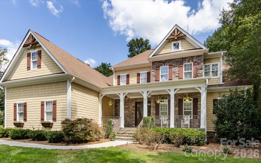 This meticulously maintained, one-owner home blends timeless design with everyday livability in one of the area’s most desirable neighborhoods. From the inviting stone front entry with rocking chair porch to the 8’ doors and transom windows, every detail exudes the warmth and quality craftsmanship you expect from a custom build.  Inside, the spacious entertainer’s kitchen is the heart of the home—offering abundant counter space, a large island with seating, and high-end Thermador appliances, including a 6-burner gas cooktop, double wall oven, and oversized refrigerator. The kitchen flows seamlessly into the keeping room with a cozy fireplace and then outdoors to a huge deck and screened-in patio, perfect for gatherings or quiet mornings surrounded by nature. The great room impresses with its soaring ceilings, stacked stone fireplace, and custom built-ins, while the main-level primary suite provides a peaceful retreat complete with a large custom-organized walk-in closet, a dual-head spa shower, and a separate whirlpool tub.  Upstairs, you’ll find another bedroom with an en suite bath and walk-in closet, plus two additional bedrooms sharing a Jack-and-Jill bath. A spacious bonus room with full bath offers endless flexibility—ideal for hobbies, exercise, or even a potential in-law suite with plumbing already in place for a mini kitchen. Additional highlights include a 3-car side-entry garage with epoxy flooring and EV charging prep, a large driveway with extra parking and turnaround space, and in-ground irrigation that keeps the lush, mature landscaping beautiful year-round.  Ideally situated in Falls Cove, one of the area’s premier communities, you’ll enjoy easy access to shopping, dining, healthcare, and Lake Norman State Park, where miles of trails and lake access invite year-round outdoor fun.  Discover the perfect blend of comfort, craftsmanship, and location—this is a home you’ll be proud to call your own.