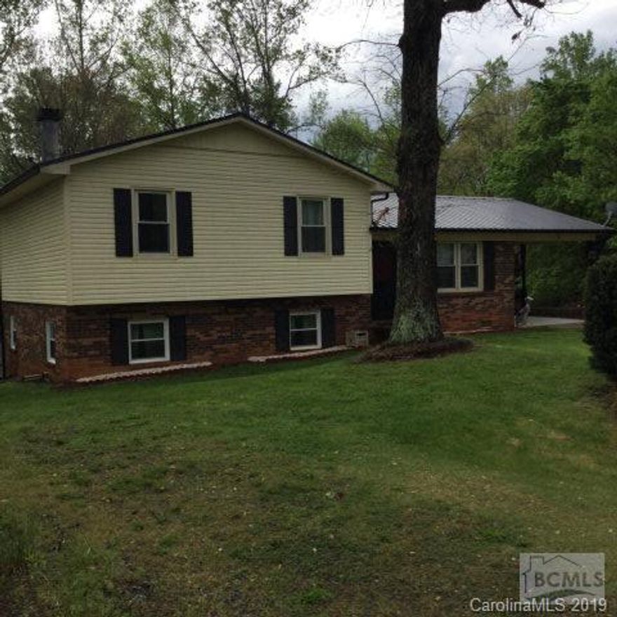 Convenient to I-40! This split level has 3 bedrooms, large living room with hard wood floors, and new carpet on the second level. Two outbuildings. CPI security system. Basement could be finished for additional living space, as it leads out to a large fenced in back yard and the soothing sounds of the creek that runs along the rear of the property. Priced to sell!