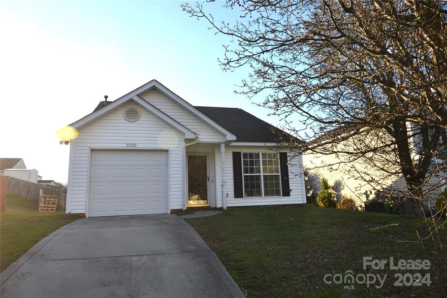 Lovely home with large fenced backyard and one care attached garage! This colorful home has large open family room with cathedral ceilings and fireplace. Great eat-in kitchen with Open area to family room. Primary Bedroom with private bath and walk in closet. Two additional bedrooms with shared hall bathroom. Private fenced backyard great for  entertaining and relaxing. Washer and Dryer remain as a convenience only.
