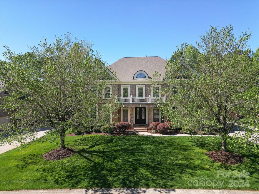 Nestled in Matthews, NC's Brookhaven subdivision, this home offers luxury and convenience. Set on nearly half an acre with a flat, wooded backyard, it features a main-level guest bedroom and meticulous updates like a 2022 roof replacement, all updated HVACs, all new carpet, and fresh paint throughout. The layout boasts an open concept with vaulted ceilings, a remodeled kitchen, and an oversized sunroom with Ezee Breeze Windows. Step outside to a serene oasis with a built-in grill and firepit. The second floor offers a luxurious primary suite, with a remodeled spa bathroom,  a soaker tub and a walk-in shower. The third floor has a bonus and theater room.  3-car garage, residents can enjoy Brookhaven's amenities and easy access to I-485. Schedule a showing today! Home is 5 bedrooms, 5 1/2 baths 5115 sq. ft.
