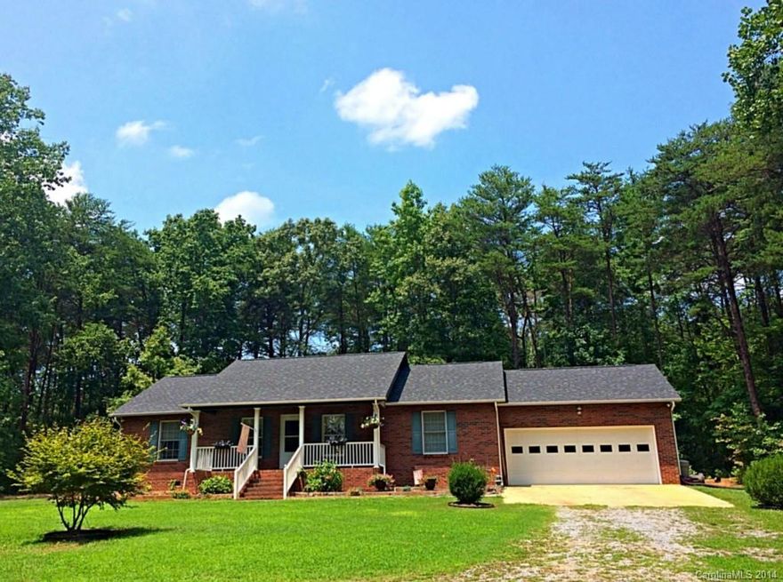 Beautiful brick ranch on one acre with a rocking chair front porch and a 12x12 screened porch and adjoining patio.  Spacious open floor plan, two master suits, one with sitting room.  Huge kitchen with tons of cabinet space, large island, new countertops  and appliances and a bay window over the sink.  New floors & ceiling fans, Kineco Water Purification system, new roof with architectural shingles, French drains in both front and back, Leland cypress & Japanese maple planted.