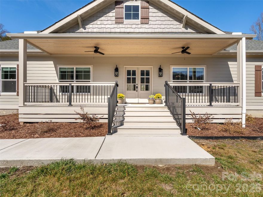 Welcome to 90 Saddle Club Lane — a rare opportunity offering versatility, privacy, and room to grow. This property can be purchased as a single home, combined with two additional lots, or secured together as three parcels — creating options for expansion, investment, or a thoughtfully planned multi-home setting.

Inside, you’ll find an inviting open floor plan designed for both everyday living and easy entertaining. Natural light fills the main living spaces, creating a warm and welcoming atmosphere throughout.

The home is thoughtfully designed with mobility in mind, featuring ramp access at the rear entrance, wider doorways, and a spacious roll-in shower. These accessible features offer comfort and functionality while maintaining a beautiful and cohesive design.

Step outside to enjoy the peaceful level setting, complete with a gentle creek flowing through the backyard — a serene backdrop for relaxing evenings, gardening, or simply enjoying the sounds of nature.

Whether you're envisioning additional privacy, future building opportunities, or a flexible living arrangement with room for extended household needs, 90 Saddle Club delivers rare adaptability in a tranquil setting.

The community offers a community barn, chickens and garden.

Opportunities like this — with land, flexibility, and accessible features — don’t come along often.

Lot 28 and 29 are by themselves too in MLS# 4351076 and PIN: 1000343 and 9546926534