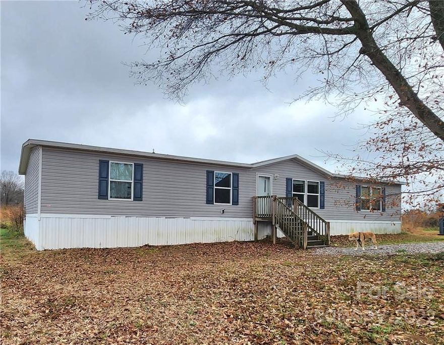 Beautiful view of South Mountains!  This 3 bedroom, 2 bathroom home, comes with an additional room that could be utilized for an office.  Features more than 3 acres and a fully fenced backyard.  Manufactured home is from 2018 and septic was pumped recently.  Additional home on property dates back to 1924 and offers great potential for restoration.