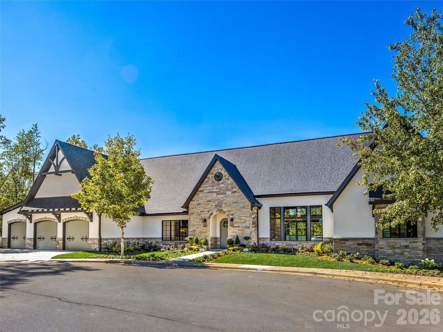 Casual Elegance at The Thoms Estate!  NEW CONSTRUCTION!  This European Cottage custom home features main level living with a bespoke design, potted garden at the front door and luxury finishes.  At the end of a large cul-de-sac, this home is an entertainer's dream.   A generous open concept plan, you enter into a large great room with vaulted ceilings and amazing views.  Two large outdoor porches with inspiring mountain views extend the space outside.  The kitchen is appointed with quartz countertops, a large island, custom hood, induction range and double fridges, and features a garden shelf to bring nature into the home.  With all primary living on the main level, follow the custom railing down to the lower-level daylight basement with recreation room and additional guest bedrooms, including a second ensuite.  Plentiful storage including a three car garage with large driveway.  Energy Star certified.  Come visit your new home in the mountains!