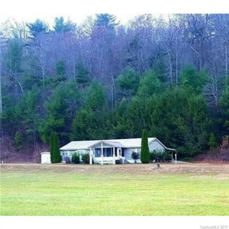 ATTENTION Horse Lovers, Investors, & anyone looking for rental potential to offset your mortgage! Property has 17+ AC, open fields, wooded lands, a broad creek & a great barn. Perfect for horses; close to Tryon International Equestrian Ctr. Great investment for cabins/tiny homes to rent as seasonal/vaca. Close to historic Saluda, Hendersonville, waterfalls & mtn attractions. Great onsite rental potential, live in 1, rent other to cover mort. Unique opportunity w/many options at your fingertips!