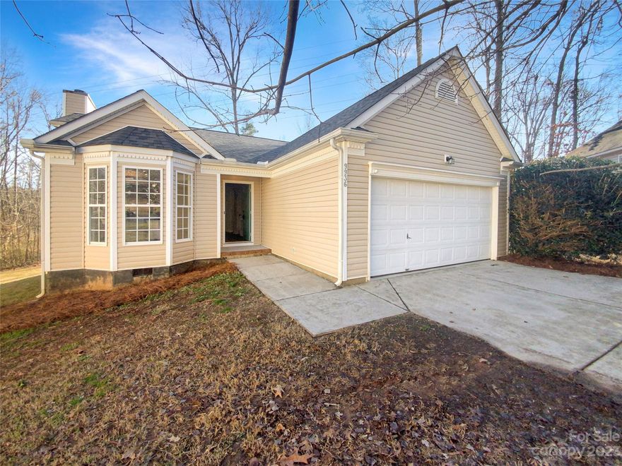 Welcome to this beautiful home featuring a cozy fireplace, perfectly complemented by a natural color palette throughout. The kitchen boasts a stylish backsplash that adds a touch of elegance, while the master bedroom offers a walk-in closet for ample storage space. With additional rooms providing flexible living options, this property is perfect for a variety of lifestyles. The primary bathroom features a separate tub and shower, along with good under sink storage. Outdoors, enjoy a serene sitting area in the backyard, providing the perfect spot for relaxation. Fresh interior paint and new flooring throughout the home create a clean and updated feel. Don't miss out on this incredible opportunity to own a property with such desirable attributes. Act now to make this house your dream home!