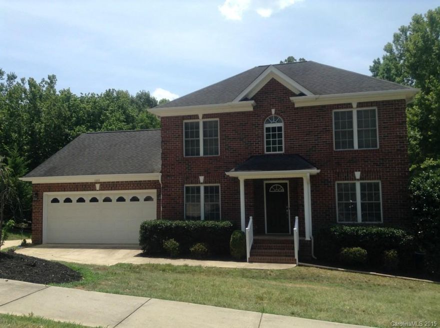 Beautiful two story brick home located in cul-de-sac!  This home features hard wood floors, both deck and patio area, fenced backyard, 2 car garage, and storage shed.  There is plenty of living space with a living room, great room, and bonus room!  The open floor plan brings you into the great room with a fireplace.  Kitchen is bright and great for entertaining with a breakfast bar!  The master bedroom has walk in closet and the master bathroom has dual sinks, garden tub, and separate shower.