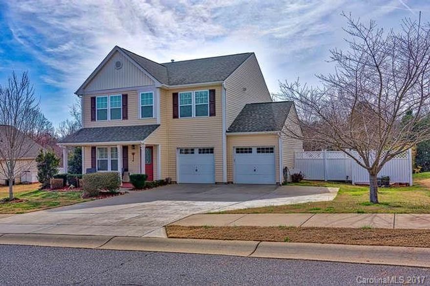 Open floor plan; Quiet location, backs to woods; 42 inch Kitchen cabinets, double stainless steel sink, center island, stainless appliances, tiled backsplash, new ceramic tile floor; Neutral carpeting / paint; Master Bath double sink / vanity,  large walk-in closet; The Loft would make a great play area, office or temporary bedroom; Oversized 2 car garage with insulated walls, ceiling and doors, half bathroom, a door to the back yard; Oversized 3-car wide driveway; Greenway trail one block away;