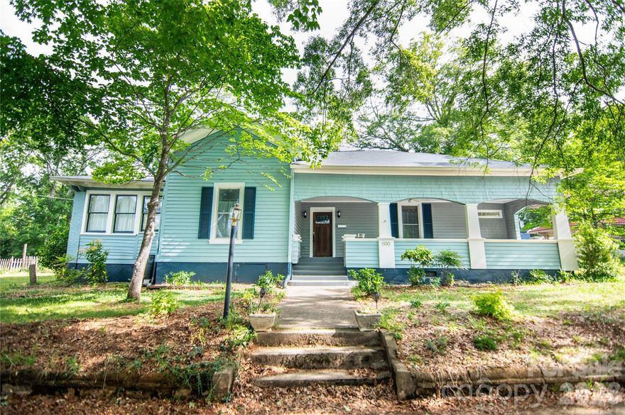 Built in 1914, this 3BR/2BA arts and crafts style home offers approximately 2,165 SF of living space in the Central Shelby Historic District near downtown Shelby. Recent updates include a new roof and freshly painted exterior while maintaining classic character throughout. Interior features central heat and air conditioning and included appliances. The property sits on a lot with a partial fenced yard, storage building, and shared driveway. Conveniently located within walking distance to downtown shops, restaurants, and community amenities, this sizable older home combines character and accessibility in an established neighborhood.