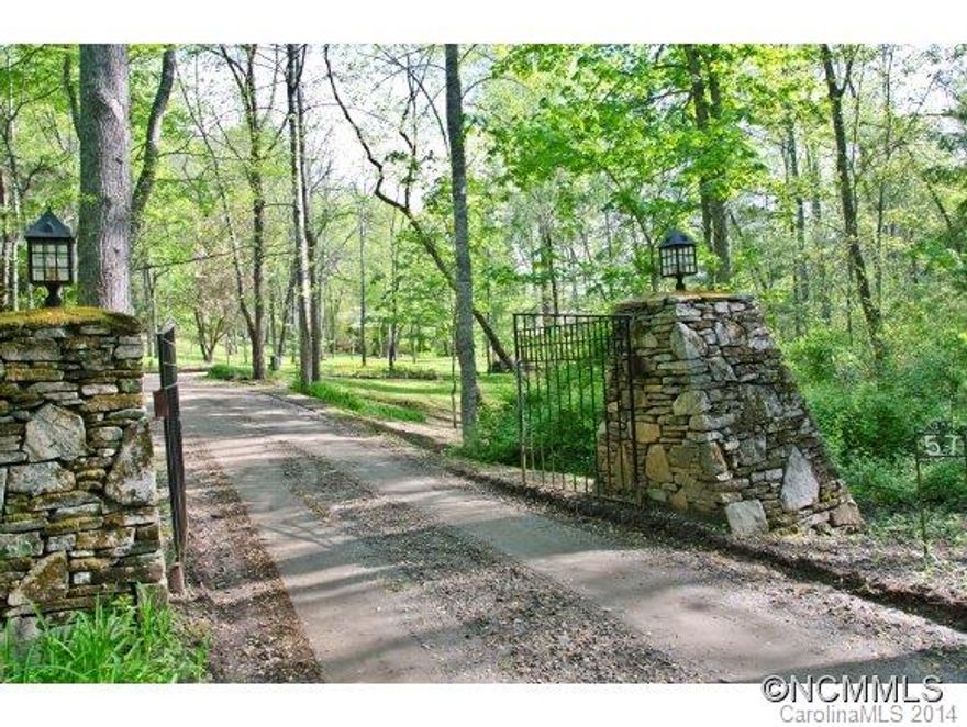 Location Location Location. The most beautiful piece of property available in Black Mountain. A considerable amount of heavy machine work has gone into the creation of the landscaped garden:A sloping lawn was created to take you from the House site to the creek. Two structures (see attached) arched bridge, meditation paths, rhododendron grove, Bamboo thicket, private setting w/ access to city sewer. Additional land available MLS 561351
