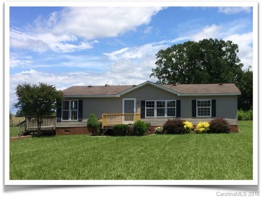 Are you looking for a remodeled manufactured home on a spacious lot in a quiet, rural setting?  If so, look no further!  With an open floor plan, the home feels much larger than the 1,296 square feet contained within.  It is well placed on a large, one acre lot with a partial brick wall aligned driveway, renewed landscaping and a quaint treehouse/playhouse in the backyard which needs your personal touch for upgrading.