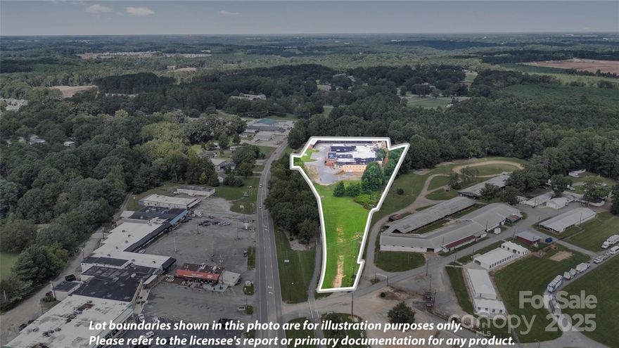 Opportunity for almost 6 acres in the heart of Troutman. Surrounded on three sides by Iredell County owned property that includes the Iredell County Rec Center and the Iredell County Fairgrounds. Turning into the facility off of Main St, you will cross over the active rail road and the newly installed Greenway Walk for the rapidly growing Town of Troutman. The growth and expansion of Troutman is at an all time high with no signs of slowing. This facility could possibly be rezoned if need be to accommodate lots of uses. Ceiling heights vary through out from 9' to almost 12'.  Facility is sprinklered.