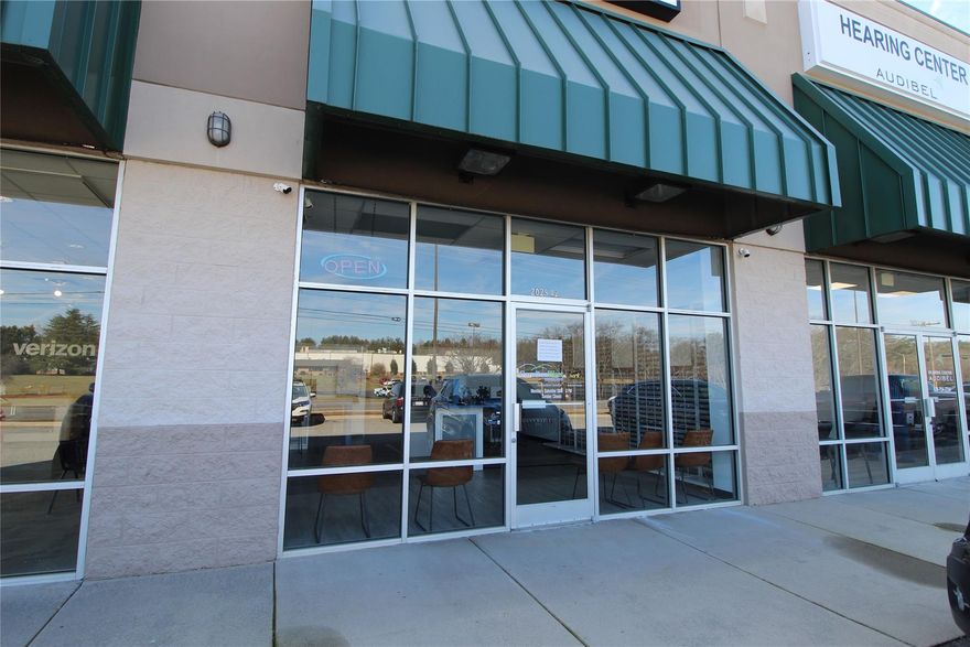 High traffic visibility retail/office suite anchored by Fair Value and Verizon available for lease.  Suitable for retail, office, doctor/dentist office, financial services, etc.  This suite faces 4 lane Morganton Blvd with NCDOT average daily traffic count of 14,000/day. Conveniently located in Lenoir with quick access to Blowing Rock, Morganton and southern Caldwell County. Very clean 1200 sq foot space showroom area along with 4 office type cubicles.  Includes a back room with a restroom, a delivery entrace and storage space. Shelving, cash register desks and center display desk do not convey. Triple Net lease where tenant pays all utilities over and above monthly rent. Minimum 2 year lease.