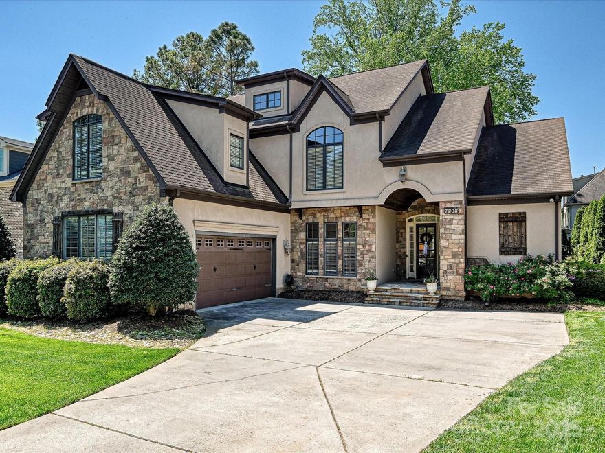 A RARE opportunity to own an exceptional home in South Charlotte’s desirable Arborway neighborhood. This expansive 5BR/5.5BA gem sits on a beautiful tree-lined street. Upscale moldings, coffered and tray ceilings, and refined finishes elevate this home. The chef’s kitchen features granite counters, high-end stainless appliances, gas cooktop, grand entertaining island, and cocktail bar—seamlessly connected to a spacious laundry/drop zone that can double as a scullery. The main-level primary suite offers a spa-inspired bath and dual walk-in closets. Upstairs, four additional bedrooms and two generous flex spaces provide room for work, play, or guests. Relax on the screened-in porch with fireplace, overlooking a beautiful stone patio and landscaped backyard—perfect for indoor/outdoor entertaining. Located only a short drive to SouthPark & Ballantyne amenities, and 20 minutes to Uptown, this exceptional home offers convenience, timeless style, thoughtful design and comfort throughout.