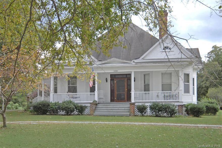 Built in 1914, this southern home boasts 12ft ceilings, original hardwood floors and character that you can't find seem to find anymore. Established on close to 3 flat acres with fruit trees, pecan trees, and a large garden for you to enjoy. Relax on the spacious covered porch after a long day and savor the quiet country life!