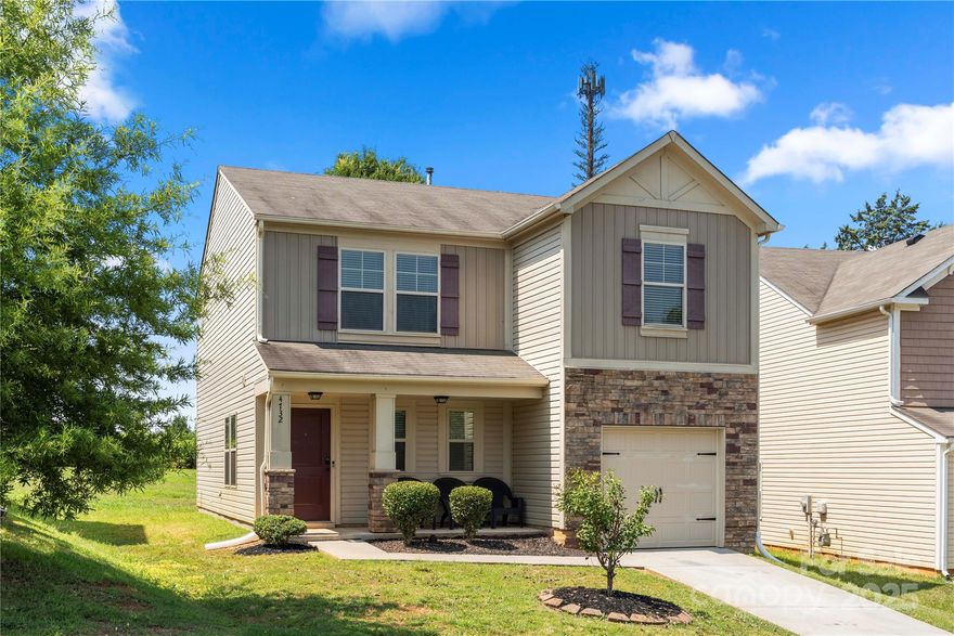 Welcome home to this lovely three bedroom home w/ rocking chair front porch plus a garage! Kitchen features awesome painted cabinetry, SS, plenty of work and storage space and opens to dining area. Living area plus formal dining/office/flex space. Powder room. Upper level primary suite offers soaking tub, shower, dual vanities, walk-in closet. Two more bedrooms up share full bath. Second sitting room/office/flex space plus laundry up. Back porch off dining area opens to huge yard perfect for entertaining! New luxury vinyl plank and new carpet, can lights, dishwasher, neutral paint. Convenient to Hwys77, 85, 485, uptown Charlotte and Lake Norman. Make your appointment to see this one today!