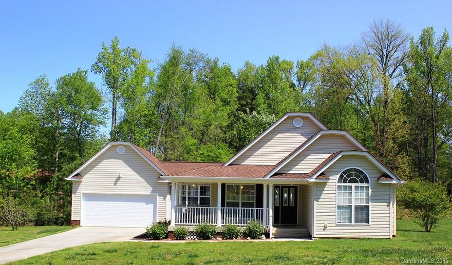 Newly updated ranch home on peaceful cul de sac lot. Move right in! New carpet and fresh paint. New garage door opener. Sip your coffee and take in the quiet surroundings from your front porch swing. Natural light floods this split ranch open floor plan with master suite separate from secondary bedrooms. Cathedral and trey ceilings throughout.