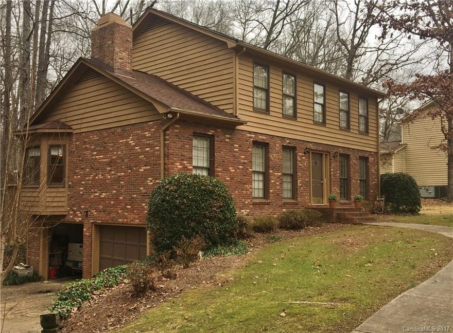 Great neighborhood and great lot! This home has options for living spaces with large den with fireplace, eat-in kitchen and formal areas on the main floor. Basement area with full bath has easy access to the garage on main floor. Master and two bedrooms on second floor.