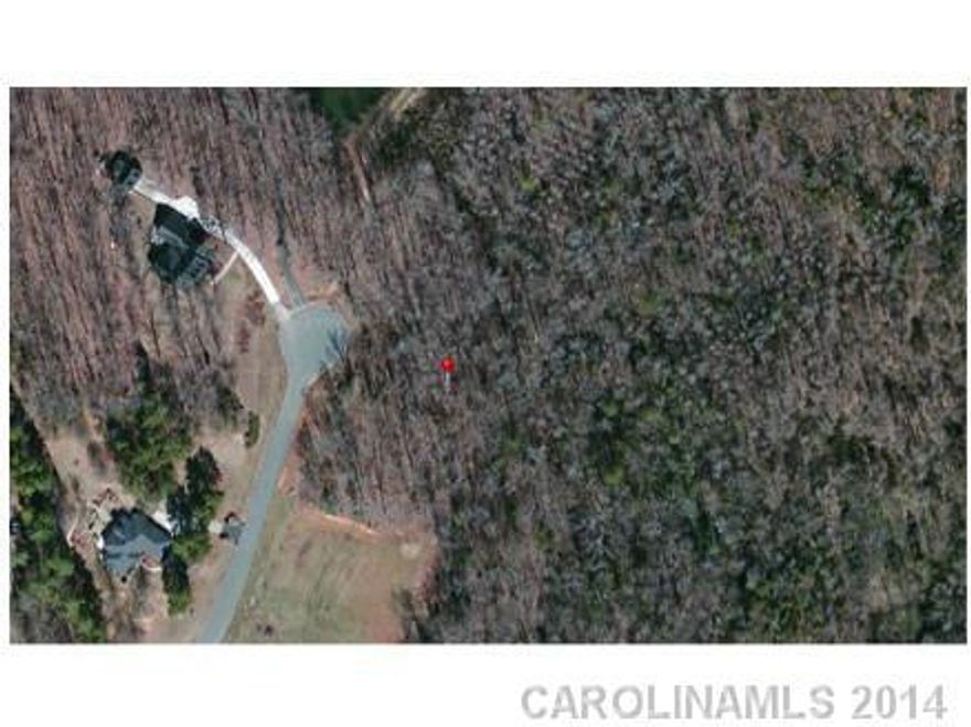 2 acre Cul-de-sak lot suited for crawl or walk-out construction.  Wooded lot and very private setting.  Lot requires well and septic.