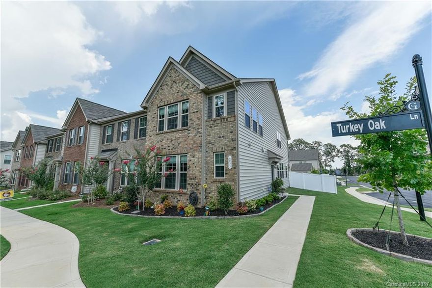 This gorgeous, end unit townhome has upgrades galore and is better than new! Large kitch with granite, lg island w/ farm house sink, huge walk in pantry, gas stove, master down, open floor plan, spacious upstairs w/ lg bedrms and loft.  So much room...all bedrooms have walk in closet and ceiling fans.  You will love the fenced outdoor space and oversized 1 car garage.  Landscaping is gardener's dream! Located across from common area & near fabulous shopping/dining! Close to Ballantyne & Waxhaw.