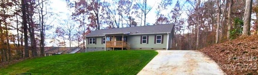 Wow! New construction 4BR/2BA home featuring a split bedroom plan, two separate areas for gathering including a front den and a rear bonus den/family room/etc...This home has it all. Huge laundry room. Primary bath shower is amazing. Tiled and glass block backsplash in kitchen, unbelievable walk in closet in primary bedroom, space galore with a fabulous covered rocking chair front porch.  Enjoy the beautiful sunsets from your back deck or kitchen window.  Come inside and see all of the great features available for your enjoyment! Seller willing to assist with buyer expenses!