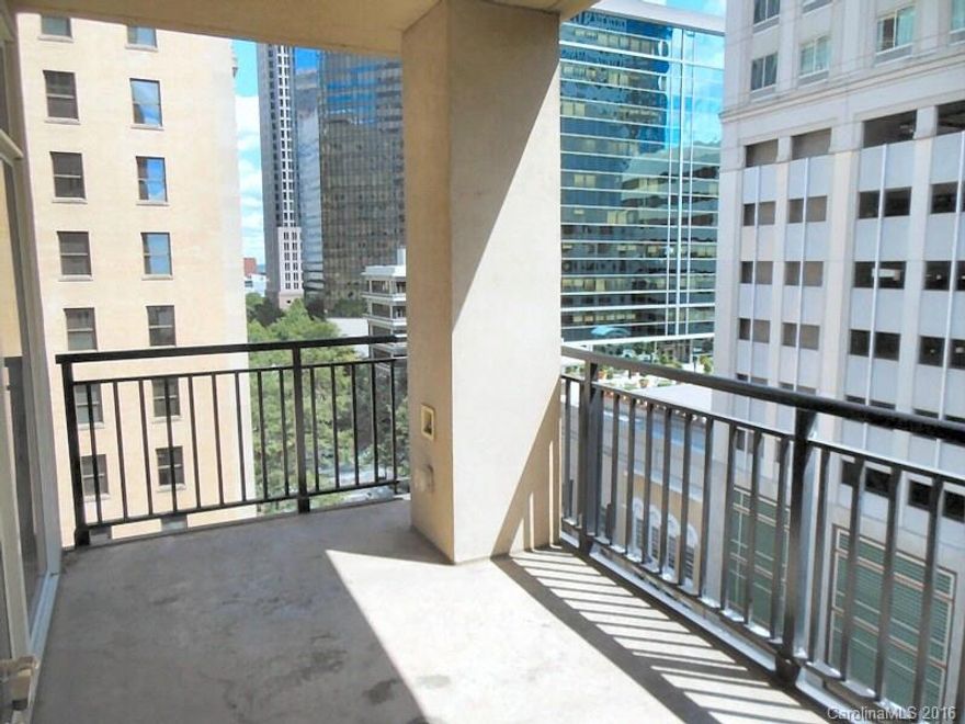 Be in the middle of uptown Charlotte. Incredible unit on the 8th floor. Great open floor plan with walls of windows everywhere! Lovely kitchen with stainless steel appliances, center island with breakfast bar and modern lighting throughout. Both bedrooms have their own baths. Nice laundry room in the unit with front load washer and dryer. Large patio/balcony to overlook the city. Building amenities such as pool, work out room, club house with pool table. prepare to be impressed.