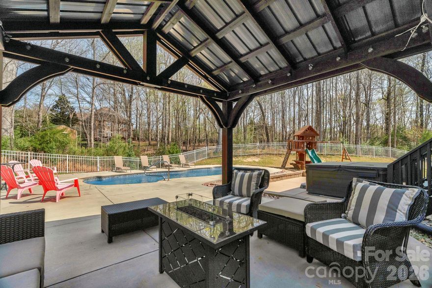 Welcome to this spacious and thoughtfully designed 6-bedroom home in Waxhaw NC, offering comfort, flexibility, and lifestyle in a highly desirable community. Located on a private cul-de-sac lot, this home features a functional layout with all bedrooms upstairs, creating a dedicated retreat space while keeping the main level ideal for everyday living and entertaining.

The open floor plan includes a well-appointed kitchen with island, ample cabinetry, and seamless flow into the main living areas, along with a dedicated office and formal dining space. Upstairs, the expansive primary suite is a true standout with a generously sized bedroom, enormous en suite bath, and an oversized walk-in closet that provides exceptional storage and comfort. Outdoor living shines with an in-ground salt water fiberglass pool and hot tub, plus inviting front porch and rear 3 seasons room that make it easy to enjoy North Carolina living year-round.

Enjoy the charm and convenience of nearby downtown Waxhaw with its local shops, dining, and community events, along with easy access to major commuter routes connecting to the greater Charlotte area. Zoned for top rated schools, this move-in ready home combines space, privacy, and location in one exceptional opportunity. Schedule your showing today.