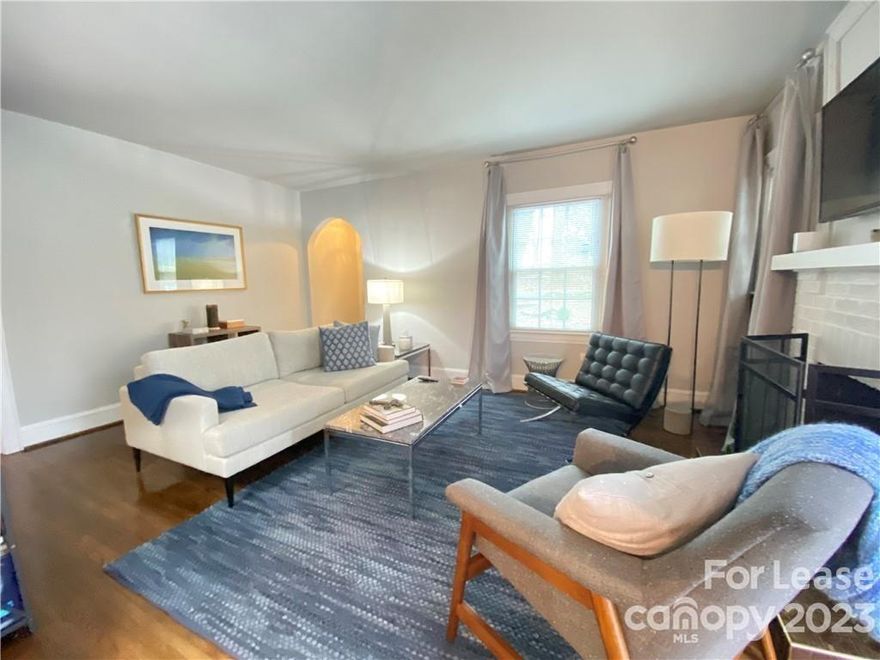 Cute, cute, cute wonderfully maintained Bungalow in established Washburn Heights! This one is a rare find, 2 bedrooms and 1 bath with true refinished hardwood floors throughout. Archways frame the living and dining room areas, The eat-in Kitchen features pantry, subway tile backsplash, stainless smooth surface range, microwave, and refrigerator. Newer windows and new HVAC unit. Enjoy morning tea or afternoon wine from the side screen porch off the living room. Great level backyard with patio area ready for summer BBQs. The washer and dryer are located  Fireplace is inoperable. Wait there's more: lawn care is INCLUDED! Close to Plaza Midwood, NoDa, and less than 1/2 mile to the Common Market on Monroe Road. Non-smoking home and 1 pet permitted (restrictions apply) with non-refundable pet fee of $300 and monthly pet rent $25,  Available mid June