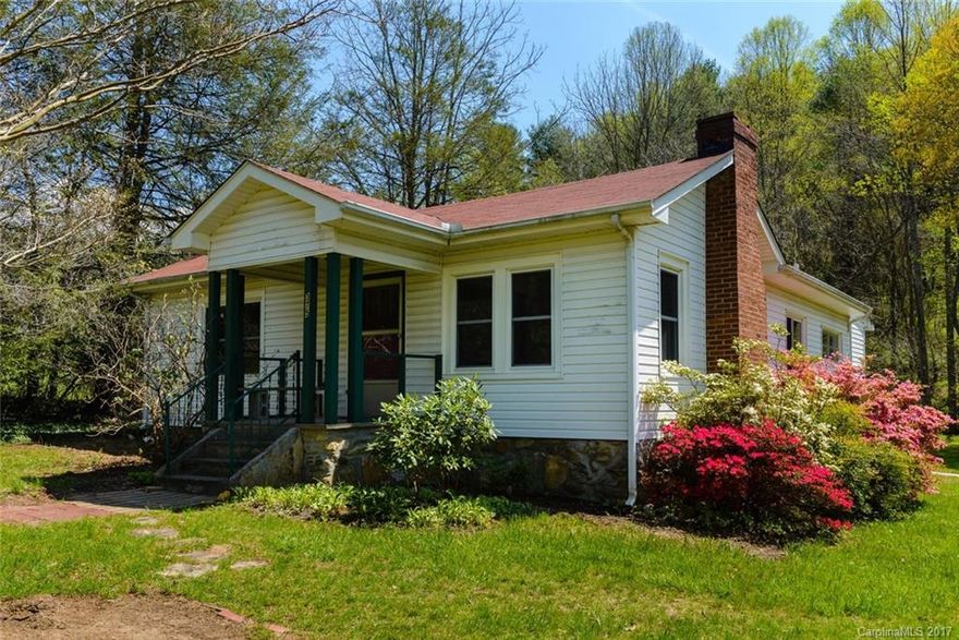 Short scenic drive minutes from Main St. Weaverville is this quaint property w/many possibilities. Charming farm house w/wood floors & built-ins, light, bright & ready for your updates. An awesome studio, w/high ceilings, wood stove, and bathroom. Thirdly, a one bedroom apartment w/office above the studio. Situated on 13.3 acres, w/generous bottom land w/2 creeks on property, ideal for gardening and/or animals wooded Mtn. land w/many building sites and knock your socks off views near the top.