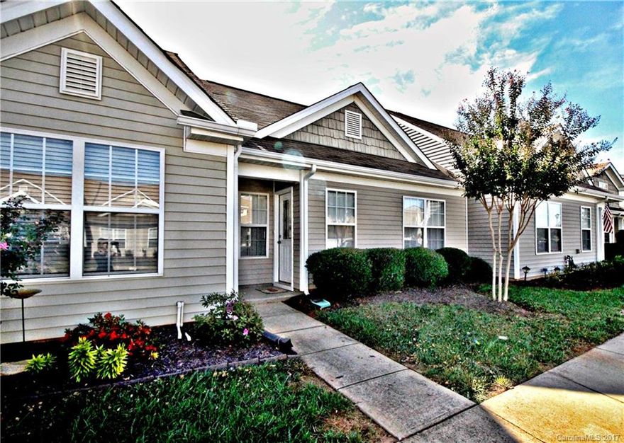 Move in ready w/private fenced in yard/patio. Wonderful open design with lots of natural light. 2 bedrooms on main level . Private spacious master suite om 2nd floor, featuring walk-in closet. Master Bath Has tile flooring.Kitchen boast of Corian countertop, breakfast bar, recessed lighting, lots of cabinet space & pantry, New Refrigerator & dishwasher. All appliances  Stays.Upgraded lighting.Custom paint. Private backyard fully fenced w/pavers. Mins to Ballantyne, W&D convey. 1Year HW included!