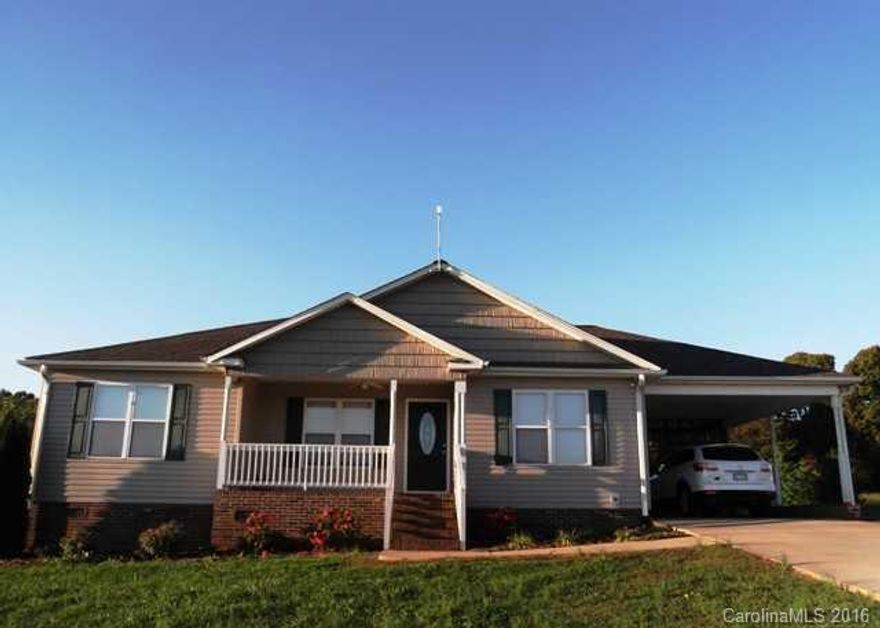 Great 3 bedroom, 2 bath home on 1 acre lot in Western Lincoln County, cul-de-sac street, maintenance free vinyl siding, covered front porch, large back deck, attached carport. Beautiful open kitchen with lots of cabinets and island, separate laundry, unique floor plan, master has 2 closets, large lot with plenty of room to enjoy the outdoors. Easy commute to Hickory and New Hwy 321.  Enjoy country living at its best.   Mls#3173761 $119,500