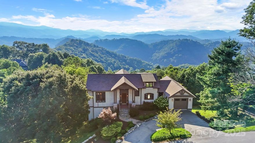 Breathtaking long-range layered views in this beautiful 3-bedroom, 3.5-bath home nestled on 1.14 acres in the exclusive Laurel Ridge gated community. LR views from nearly every room, this light-filled retreat offers timeless finishes & a seamless connection to nature. Soaring windows, rich wood floors, & a grand stone fireplace create an atmosphere of warmth & sophistication. Multiple expansive decks & patios invite indoor-outdoor living, perfect for morning coffee or evening gatherings against a backdrop of Blue Ridge beauty. Open floor plan kitchen, dining & living on the main level plus cozy lower level den with wetbar & wine refrigerator. Flex space over the garage.  Each bedroom features private or ensuite bath access. Home is being sold furnished with exceptions: Ring doorbell, indoor cameras & several staging items (see list in listing documents). Whether you’re seeking a peaceful retreat or year-round living close to Boone & Banner Elk, this one checks every box. STR Permitted.