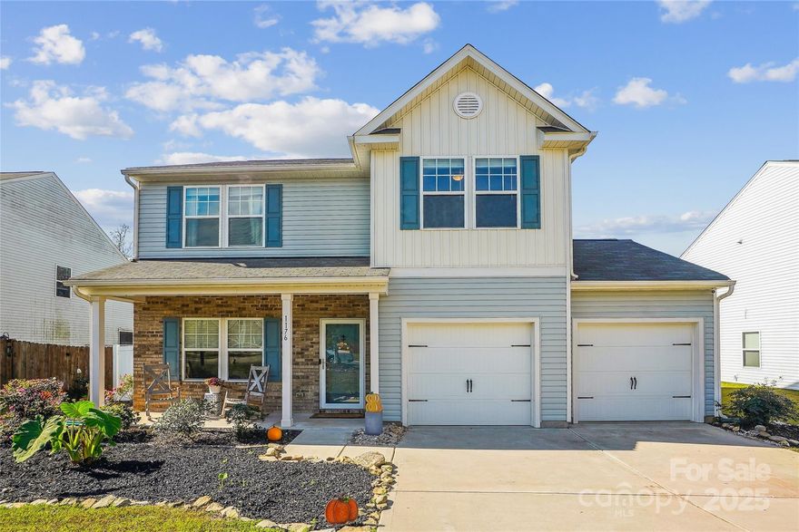 Seller offering $2500.00 towards closing cost. Discover the charm of this upgraded 3-bedroom, 2.5-bath home, where modern luxury meets lakeside tranquility. Every inch has been thoughtfully enhanced for contemporary comfort. New LVP flooring adds elegance, complemented by a custom accent wall & 9-foot ceilings. The open living area flows into a kitchen featuring granite countertops and custom cabinetry. Windows flood the space with natural light, showcasing breathtaking lake views. The primary suite boasts a spa-like bath with a soaking tub, separate designer tiled shower, and elegant fixtures. Two additional bedrooms and bonus area are perfect for family, guests, or a home office. Step outside to take in the extensive landscaping and onto your private screened in deck with power for morning coffee or evening gatherings, with the picturesque lake as your backdrop. This home also features a private dock, perfect for paddle sports and embracing lakeside living.