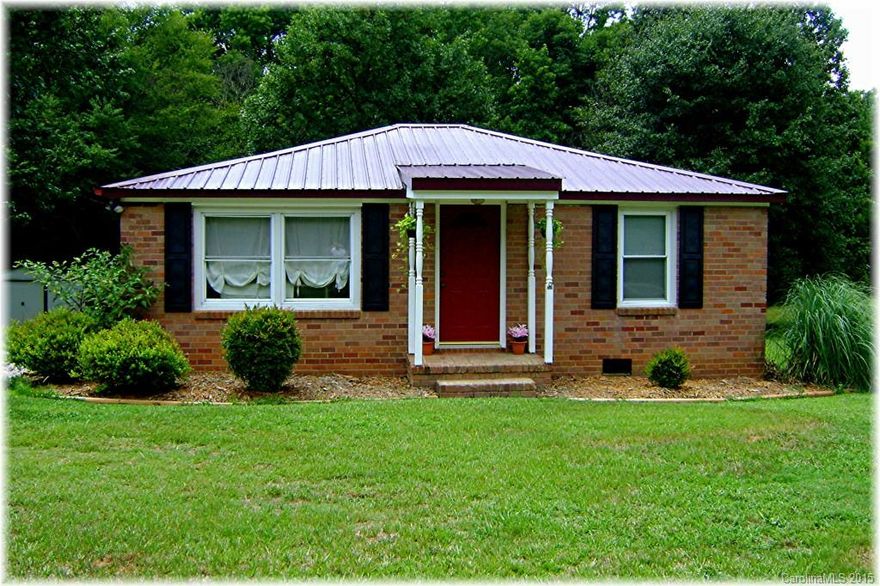 Nice, full brick small home on 1/2 acre lot. Approximately 12 year old renovation including insulated windows, gaspac HVAC, metal hip roof, vaulted ceiling in den. Gas range and laminate flooring in kitchen & foyer. Long double driveway with plenty of parking & room for turn around. Open floor plan you would not expect in a home of this age! Dedicated office & split bedroom plan for privacy.  Clean & nicely decorated, ready for a new owner!