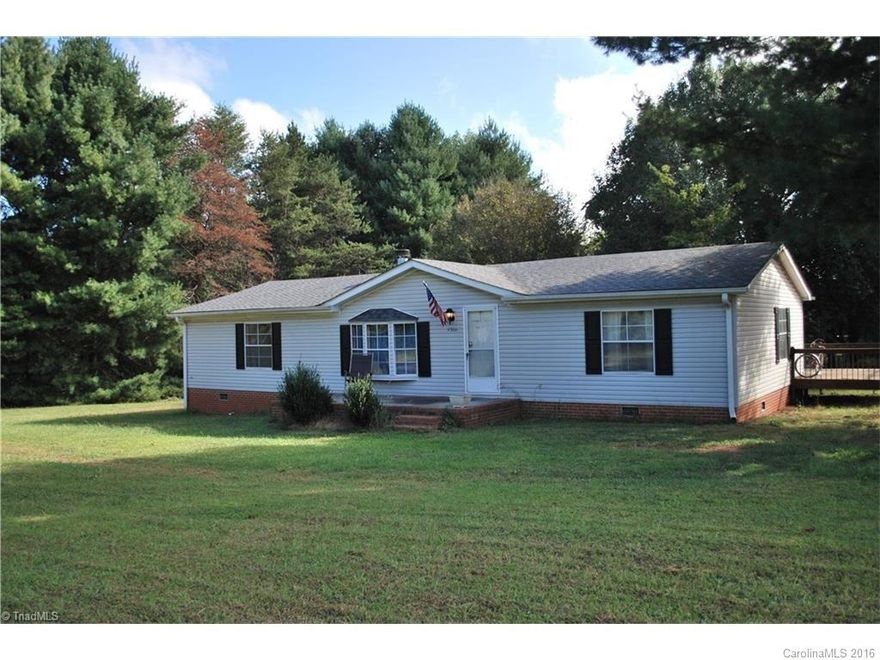 Well kept, 3BR, 2BA double wide on private half acre lot. Cathedral ceiling and wood burning fireplace in living room. Nice, large deck and masonry front porch. Roof replaced in May 2012, HVAC 2005.